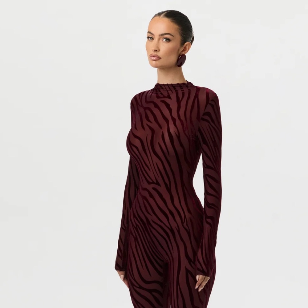 Naked Wardrobe Burnout Closed Toe Jumpsuit in Zebra Dark Plum